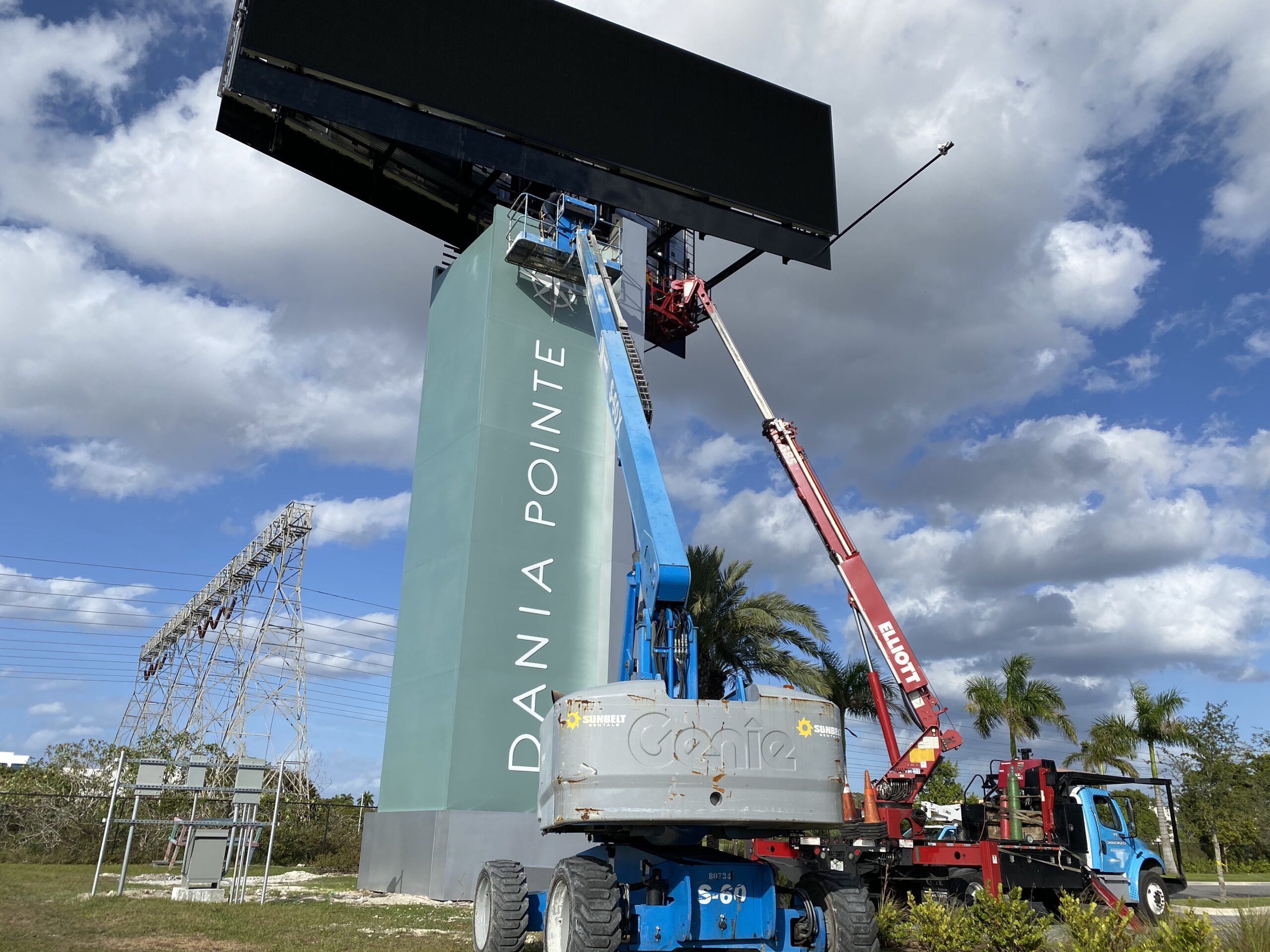 Crane-supported pylon sign installation by Eastern Signs